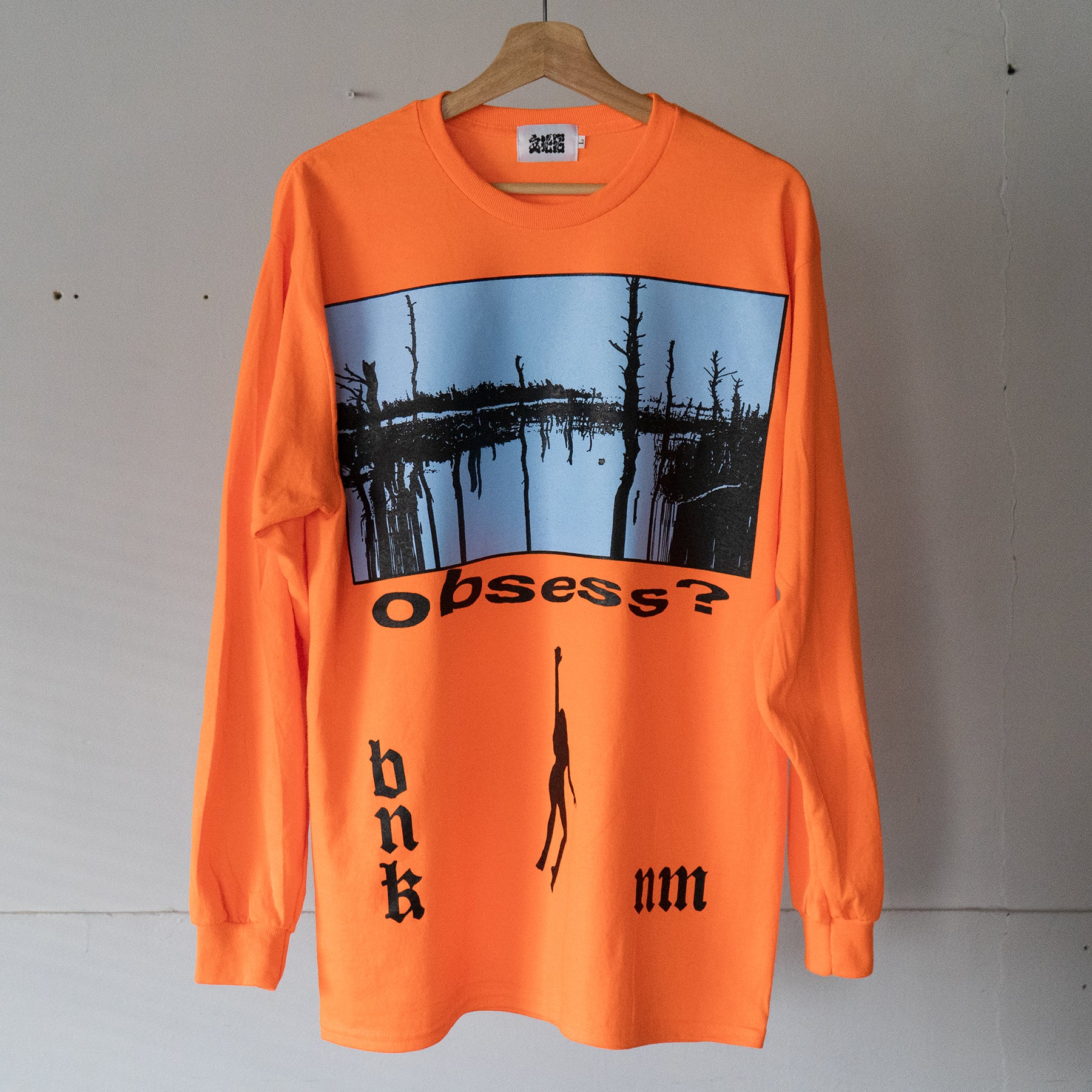 10-obsess-long-tee-deli-safety-orange